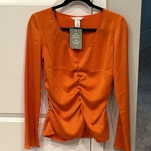 H&M Size Small - gathered blouse with bell sleeves.